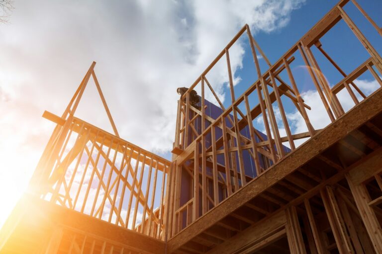 Framed New Construction of a House Building a new house Wooden framing of a home, full frame